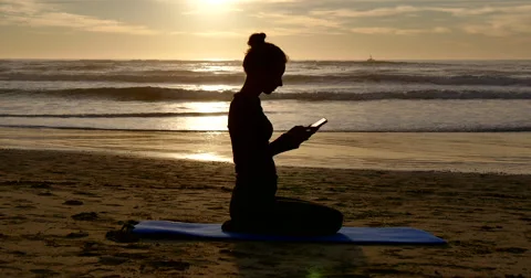 Girl with Tablet on the beach Stock Footage 48820139