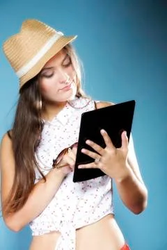 Girl with tablet computer ebook reader touchpad pc Stock Photos