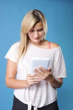 Girl with tablet computer ebook reader touchpad pc Stock Photos