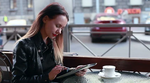 Girl with tablet drinking coffee Stock Footage 50981241