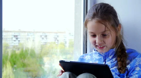 Girl with tablet Stock Footage 53266379
