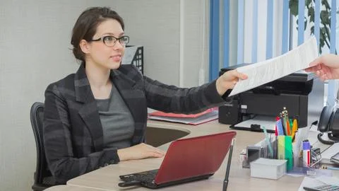 Girl takes documents Stock Photos