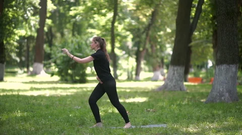 The girl takes a step and stretches a hand. Stock Footage