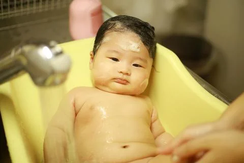 Girl taking a bath Stock Photos