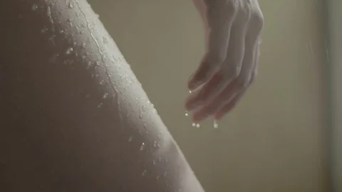 Girl taking a bath in slow motion close up shot raw footage Stock Footage 71755340