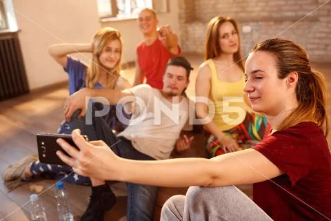 Girl taking selfie with friends in fitness studio Stock Photos
