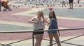 Girl taking a selfie in Placa de Catalunya, Barcelona 4k or 4k+ Resolution