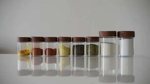 Girl taking a spice Stock Footage 72692804