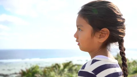 A Girl Talking About Something While Gazing at the Sky and Looking Out at the Stock Footage 333186016