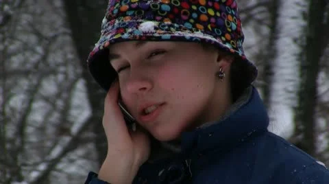 Girl talking on cellular phone Stock Footage