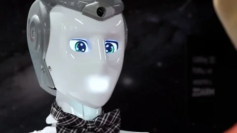 Girl is talking with the humanoid Stock Video Pond5