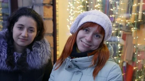 Girl talking looking at the camera, she sniffs. Cold, winter, real-time, evening Stock Footage 83355107