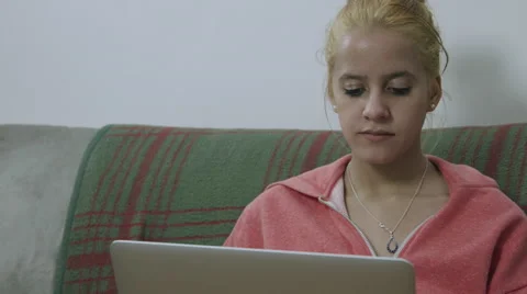 Girl Talking while on laptop Stock Footage 59842304