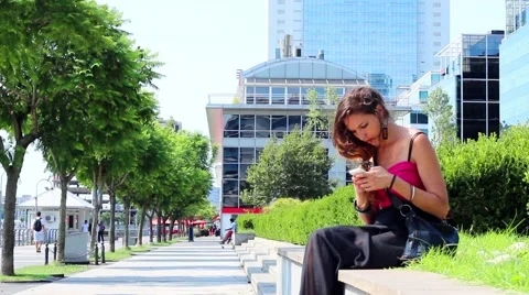 Girl tapping the smartphone Stock Footage 46533751