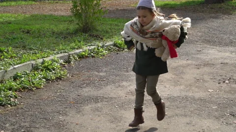 Girl with teddy. Stock Footage 141875633