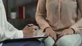 Girl telling psychologist about problems and worries, advice of skilled doctor HD Footage