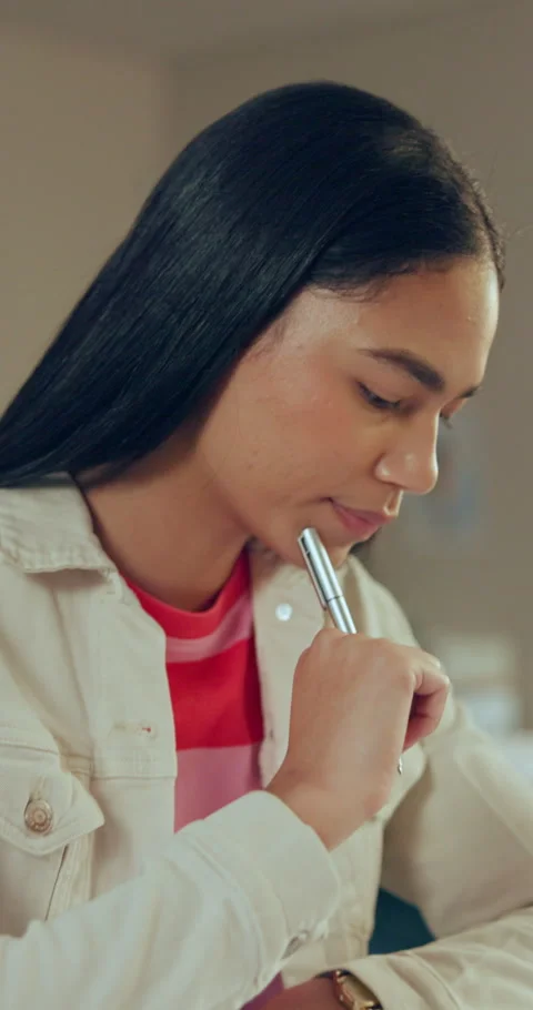 Girl, thinking and exam in class with pen for math quiz answer, knowledge and Stockbeeldmateriaal 323433454
