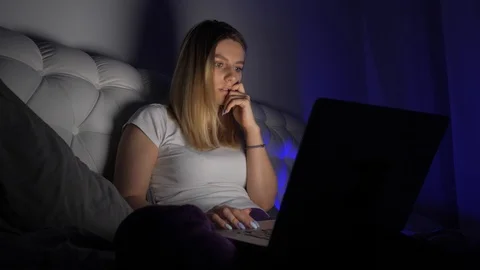 Girl thinks what to write Stock Footage 105897043