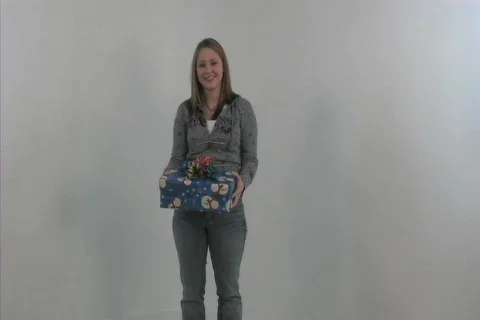 Girl throws present Stock-Footage 106611