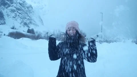 Girl throws snow up Stock Footage 103585572