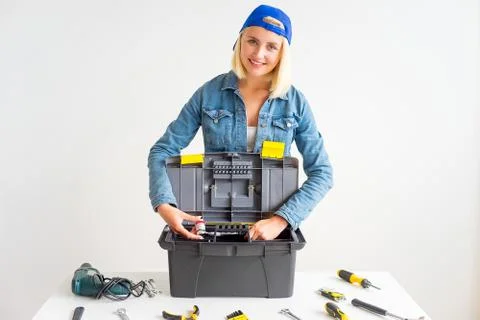 Girl with tools Stock Photos
