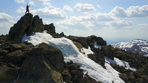 Girl on top of the mountain raises her hands up Stock Footage 116346309