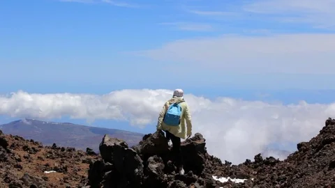 Girl on top of volcano. 動画素材 78280698