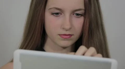 Girl with a touch screen tablet Stock Footage 50586838