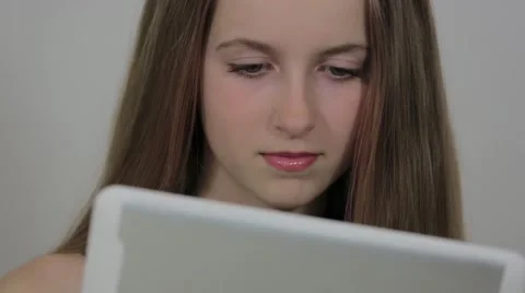 Girl with a touch screen tablet Stock Footage 50587222