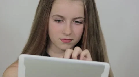 Girl with a touch screen tablet Stock Footage 50587278