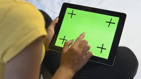 Girl Touching Green Tablet Screen Stock Footage 80677714