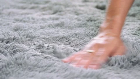 Girl touching the rug close up Stock Footage 236302805