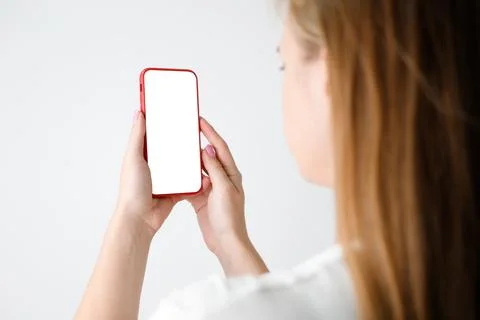 Girl touching a screen of her smarthone. Horizontal Stock-Fotos