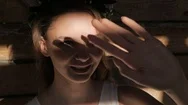 Girl Touching The Sunlight By Hand In Her Room At Home. Happy Woman Looking  Stock Footage