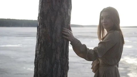 Girl is touching the tree Stock Footage 90511715