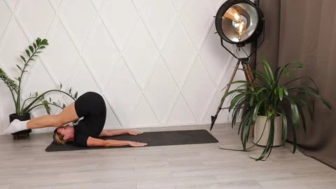 Girl training. Exercise stretching and press Stock Footage 280159892