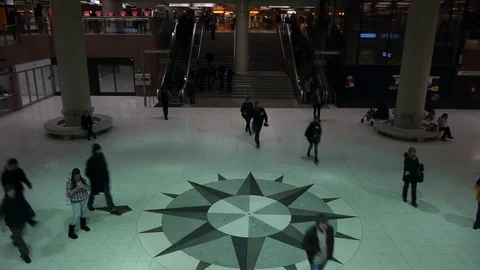 Girl transfixed while the rest move about Video stock 69862185