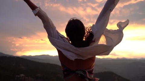 Girl traveling top of mountain free happy Stock Footage