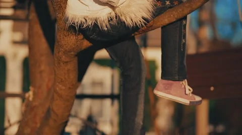 Girl is on a tree with a tablet Stock Footage 47980594