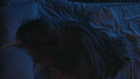 The girl is trying to sleep Stock Footage 158764914