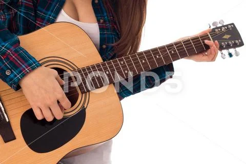 Girl Tunes The Guitar