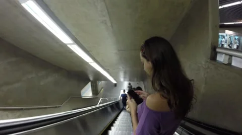 A girl type a message while its down the stair 스톡 동영상 57829107