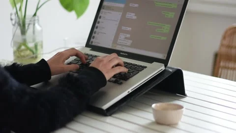 Girl types computer keyboard. Smart work at home. Whatsapp. Stock Footage 153442606