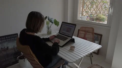 Girl types computer keyboard. Smart work at home. Stock Footage 153442650