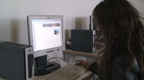 Girl typing on a computer Stock Footage 37319349