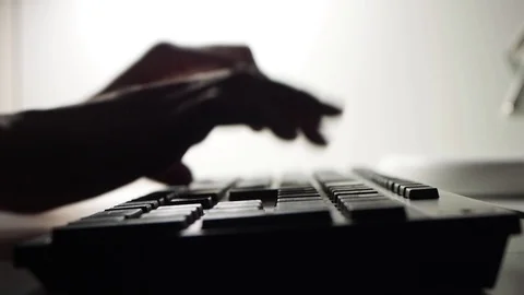 The girl is typing on the computer. Stock Footage 129899612