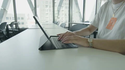 Girl typing on computer tablet close-up Stock Footage 168991248
