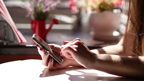 The girl is typing a message Stock Footage 87389691