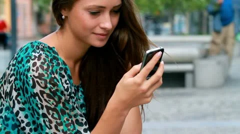 Girl typing on a mobile. Stock Footage 12154060