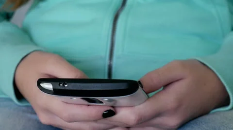Girl typing or texting message by smartphone 스톡 동영상 58317094
